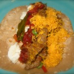 When it's slathered in cheese it looks almost exactly like the tacos I made last week...